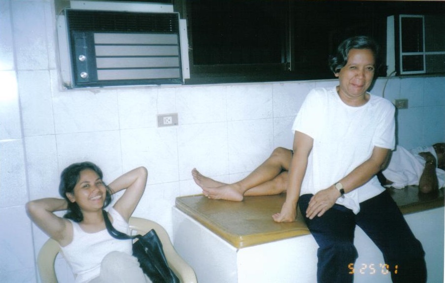 Two Women Smiling To The Camera