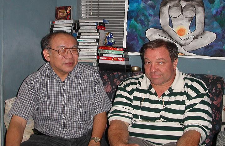 Two Men Sitting In The Couch